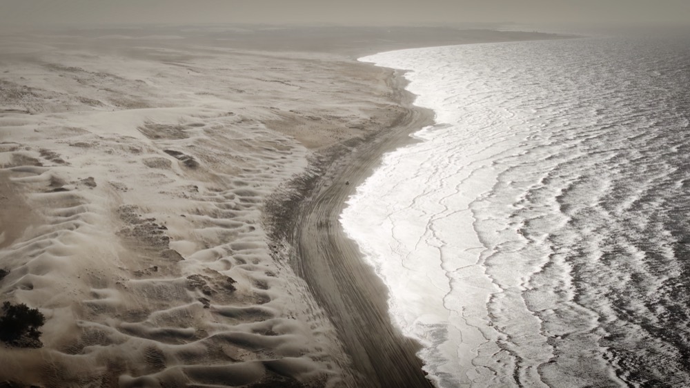 Aerial view of the Tatajuba dunes meeting the sea
